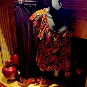 Small pants   Runs big.  Xl top